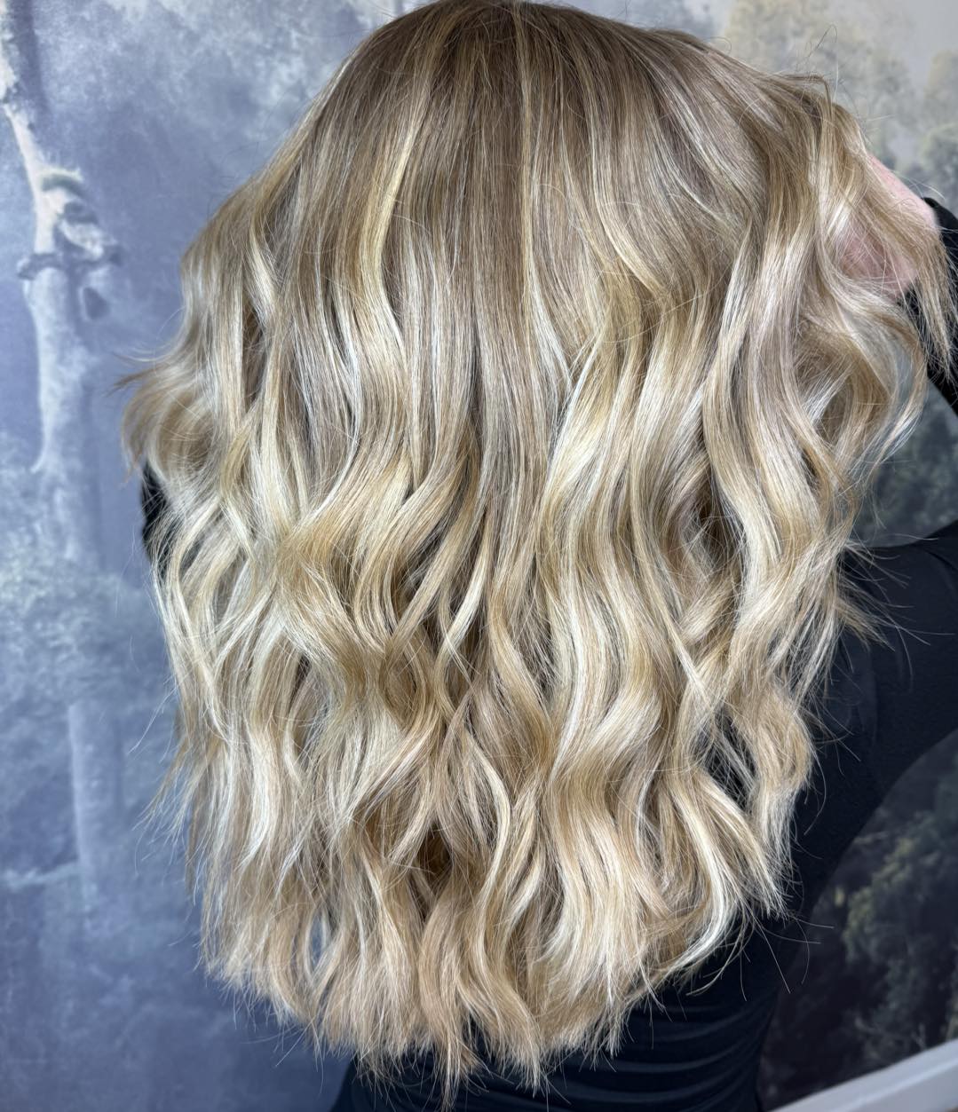Soft blonde balayage with textured waves created at Verde Hair Lounge