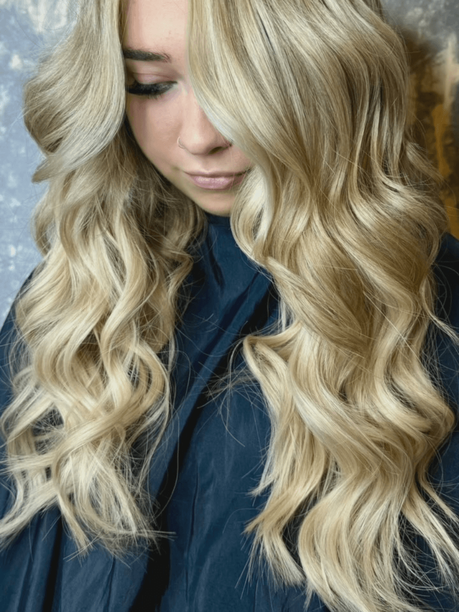 Bright creamy blonde hair colour with soft curls created at Verde Hair Lounge