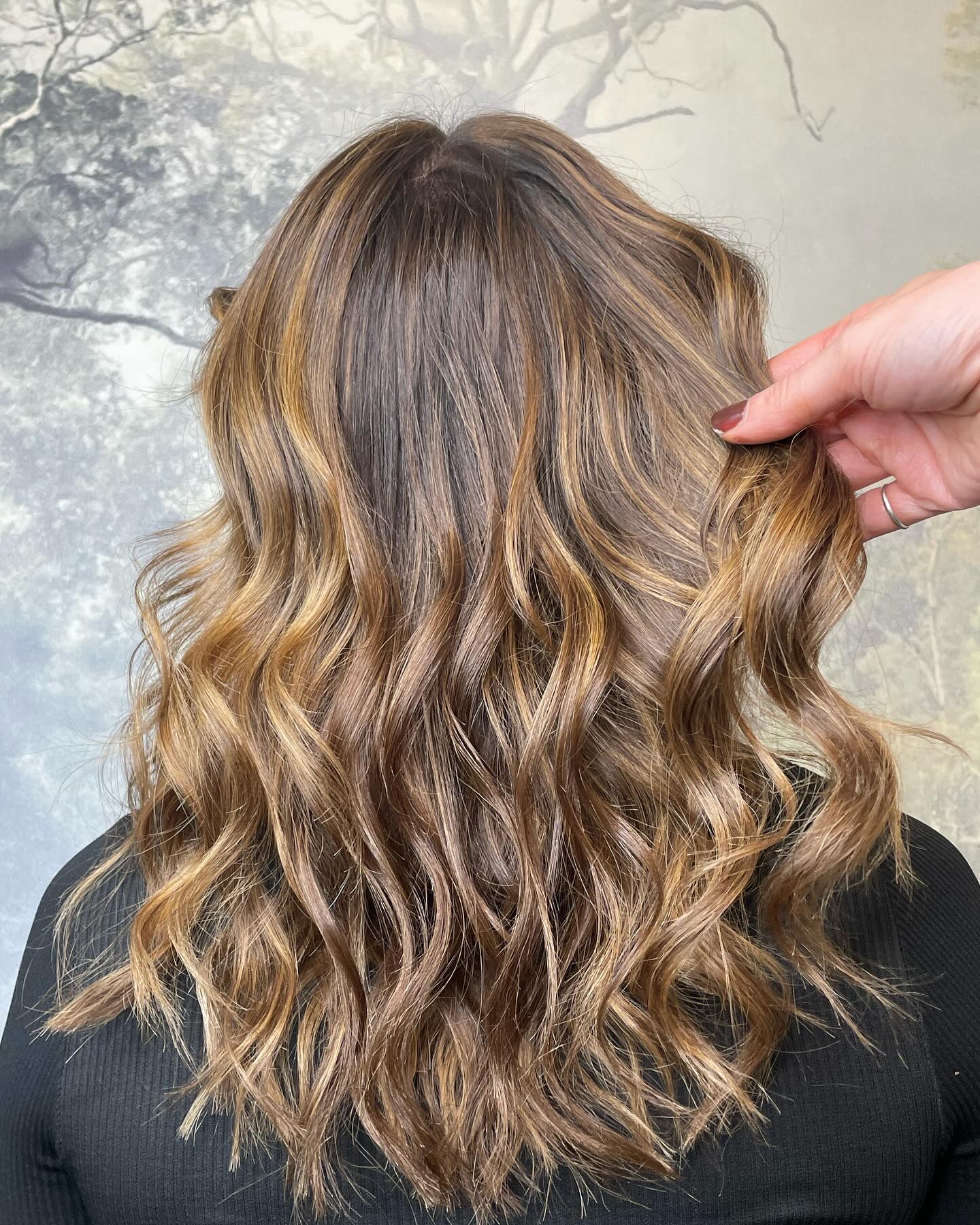 Bronde balayage with soft caramel ribbons and natural dimension